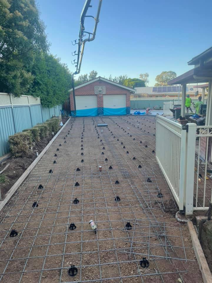 A driveway bay laid out with steel mesh on bar chairs ready for the pour